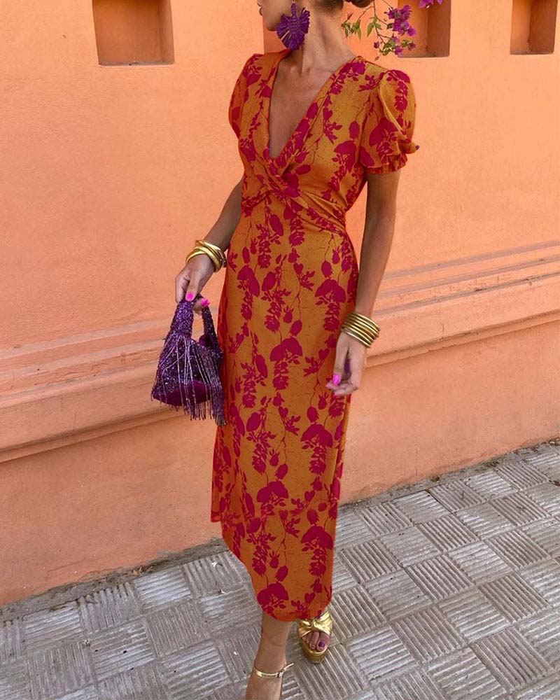 Robe A‑line élégante à imprimé feuilles, col V profond et manches bouffantes