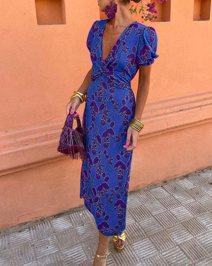 Robe A‑line élégante à imprimé feuilles, col V profond et manches bouffantes