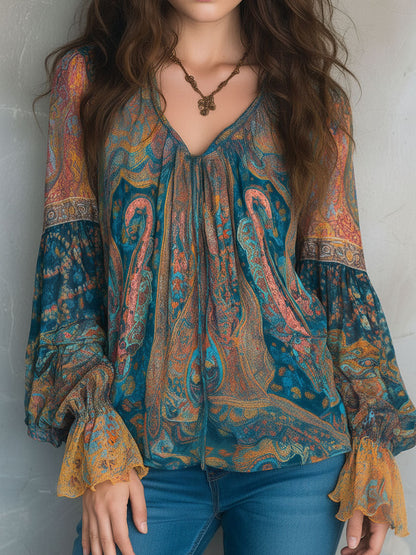 Blouse en mousseline de soie à motif cachemire bohème bleu sarcelle et ambré avec poignets à volants