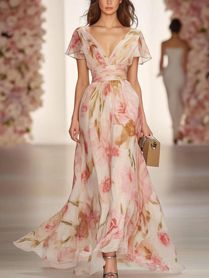 Robe longue rose à manches courtes et col en V