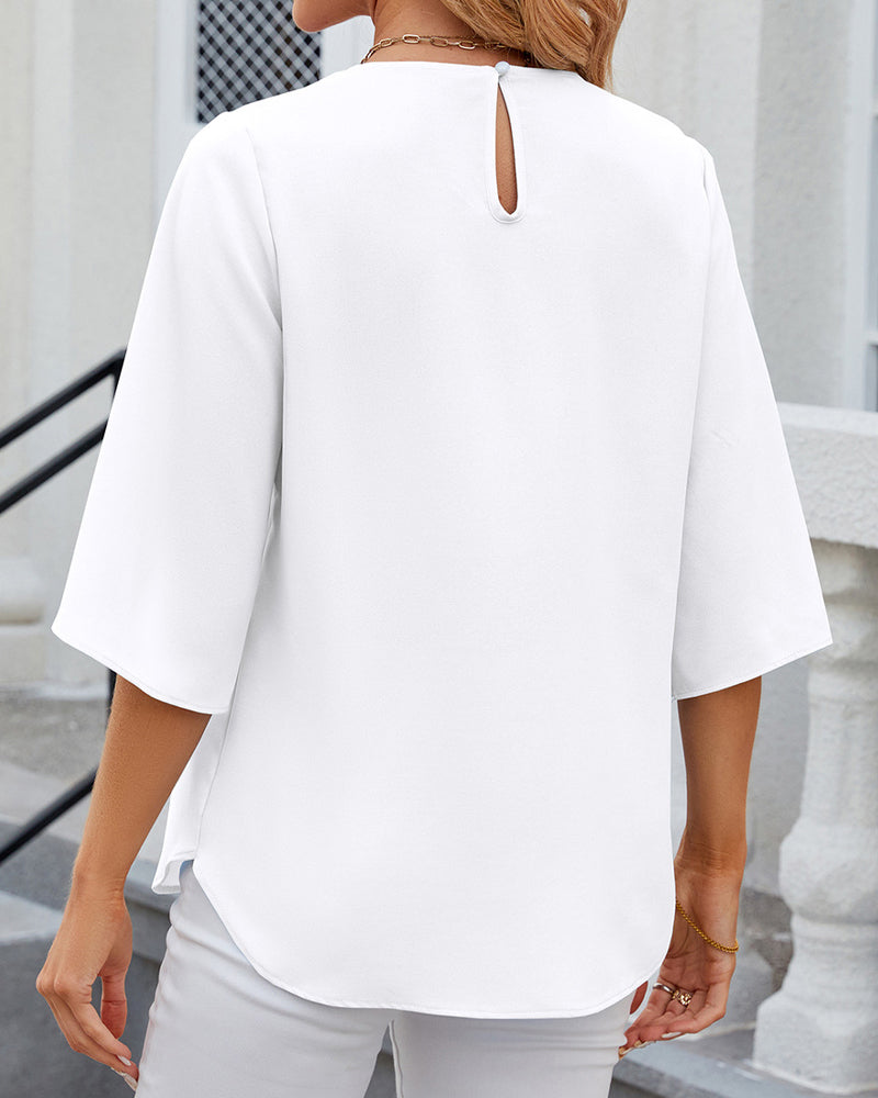 Blouse élégante unie à manches courtes