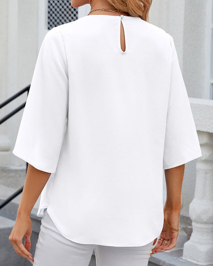 Blouse élégante unie à manches courtes
