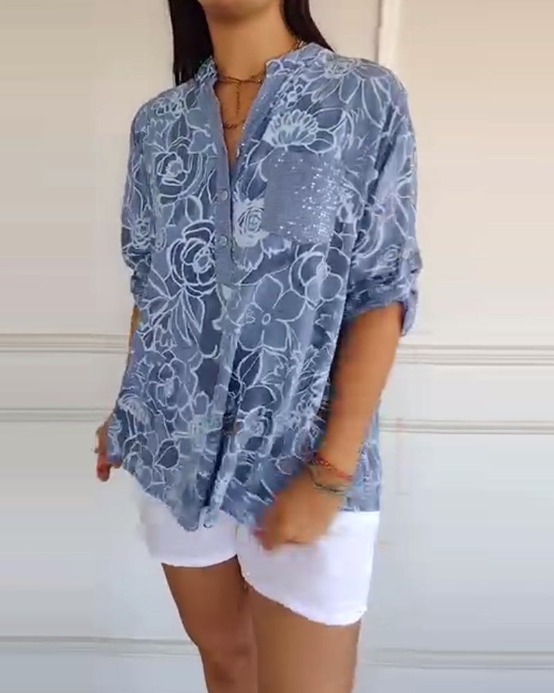 Blouse imprimée à col V avec boutonnage devant