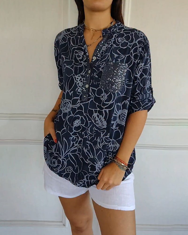 Blouse imprimée à col V avec boutonnage devant