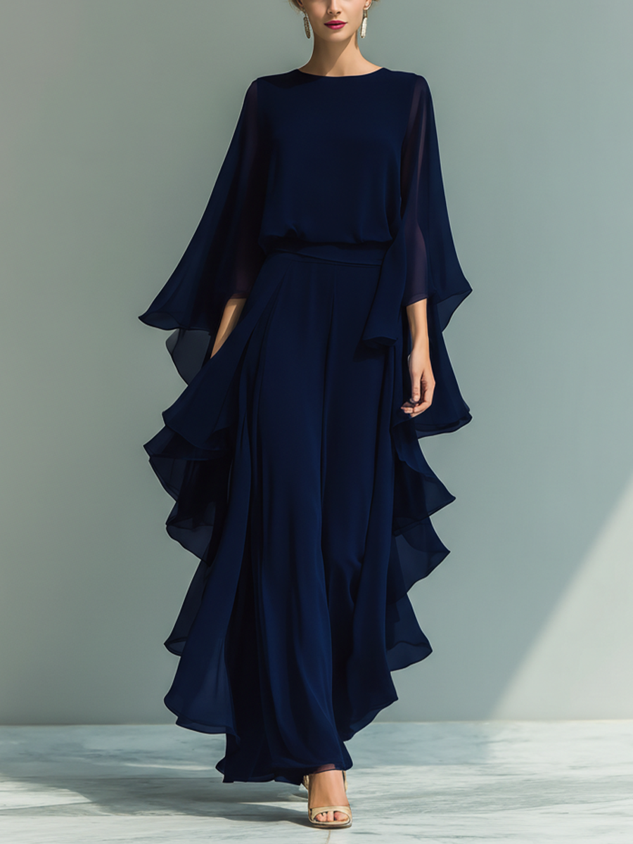 Ensemble pour femme composé d'un haut en mousseline bleu marine à manches évasées et d'un pantalon droit avec des détails à volants