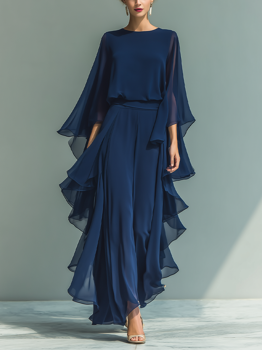 Ensemble pour femme composé d'un haut en mousseline bleu marine à manches évasées et d'un pantalon droit avec des détails à volants