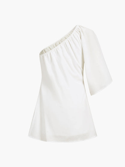 Robe courte asymétrique en coton et lin de la mer Égée