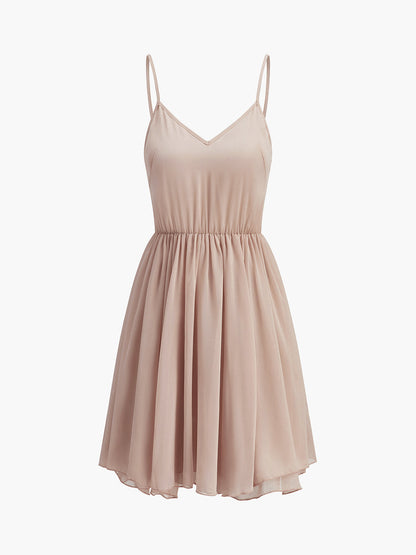 Robe à volants en mousseline semi-transparente avec cape extérieure
