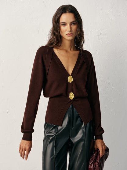 Pull en mélange de laine à col V avec détails métallisés
