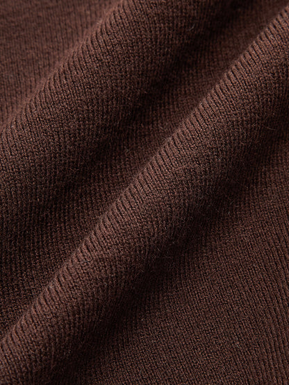 Pull en mélange de laine à col V avec détails métallisés