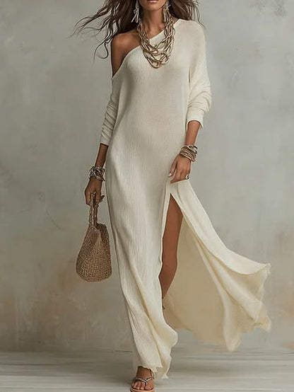 Robe féminine élégante en tricot à manches longues, plissée et avec fente