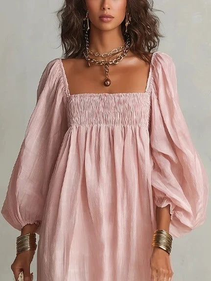 Robe longue bohème à encolure carrée, buste smocké et manches bouffantes
