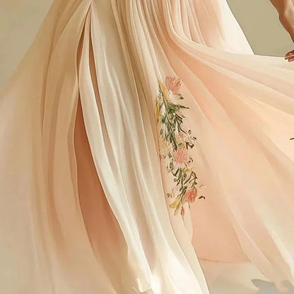 Robe longue rose à manches courtes et col en V