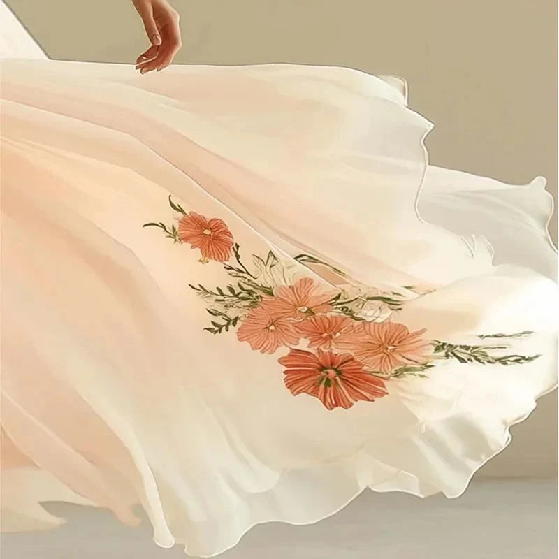 Robe longue rose à manches courtes et col en V