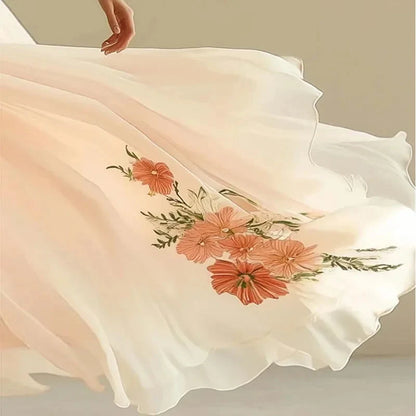 Robe longue rose à manches courtes et col en V