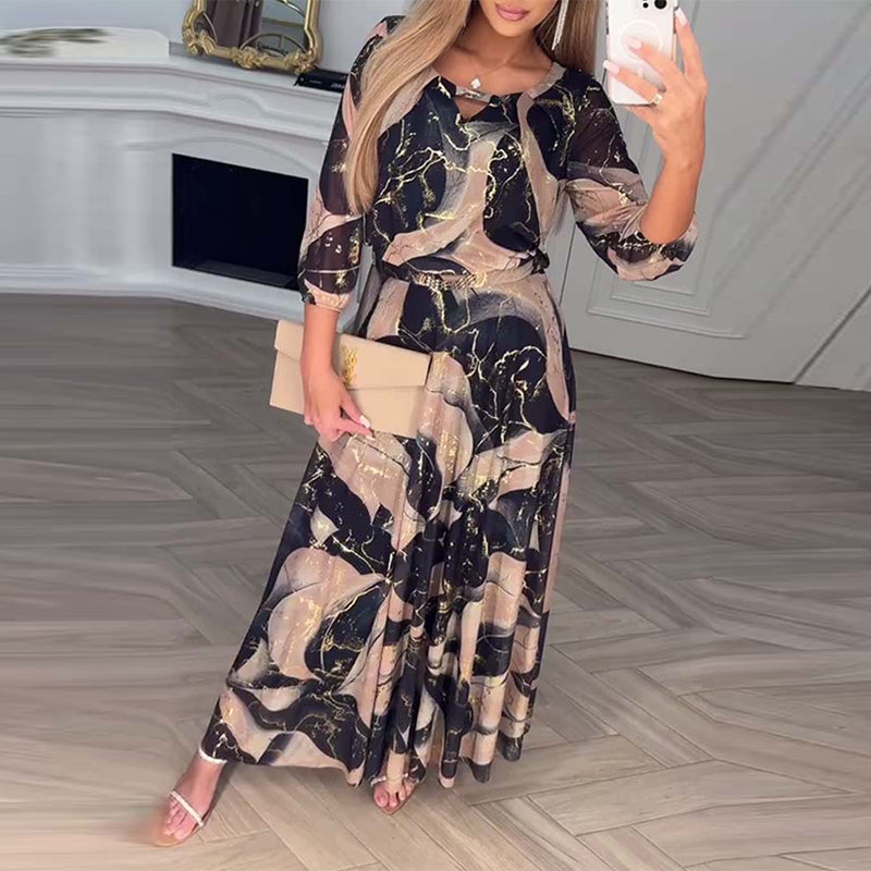Robe élégante imprimée à manches trois-quarts et taille cintrée