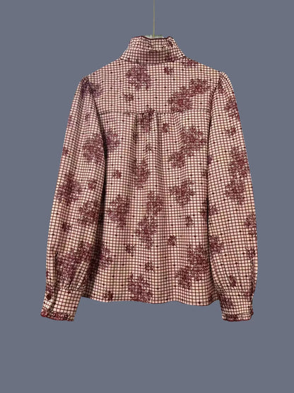 Chemise à boutons à carreaux avec volants