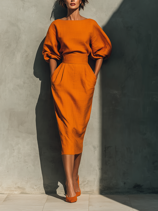 Ensemble femme haut mi-manches et jupe midi orange