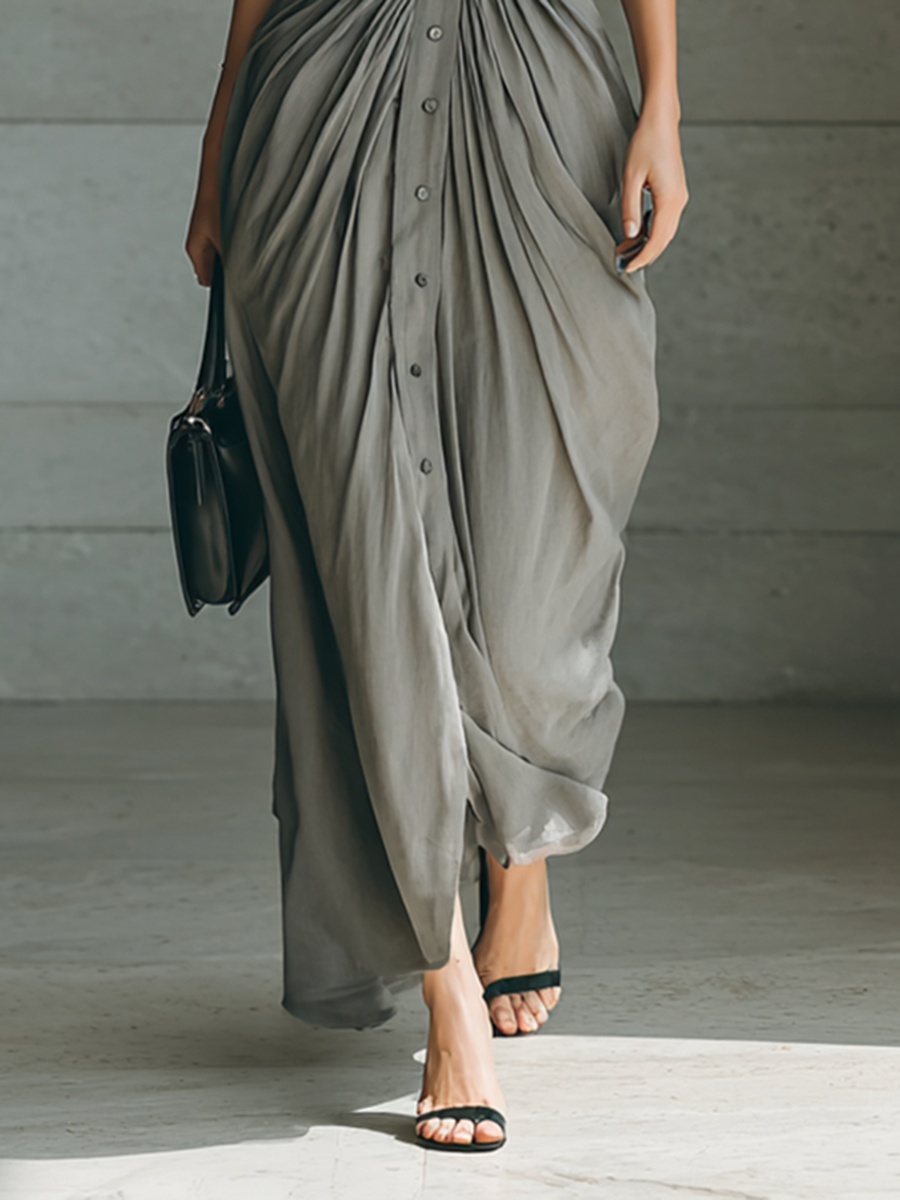 Robe maxi à revers, manches longues et ceinture, boutonnage simple.