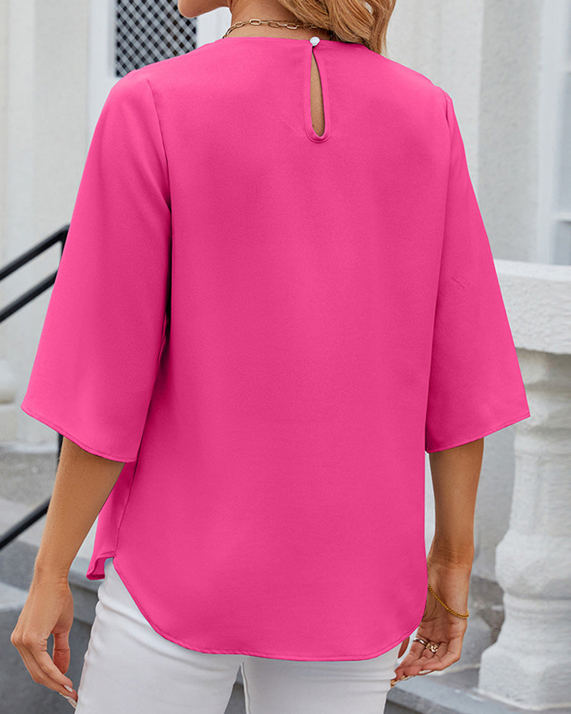 Blouse élégante unie à manches courtes