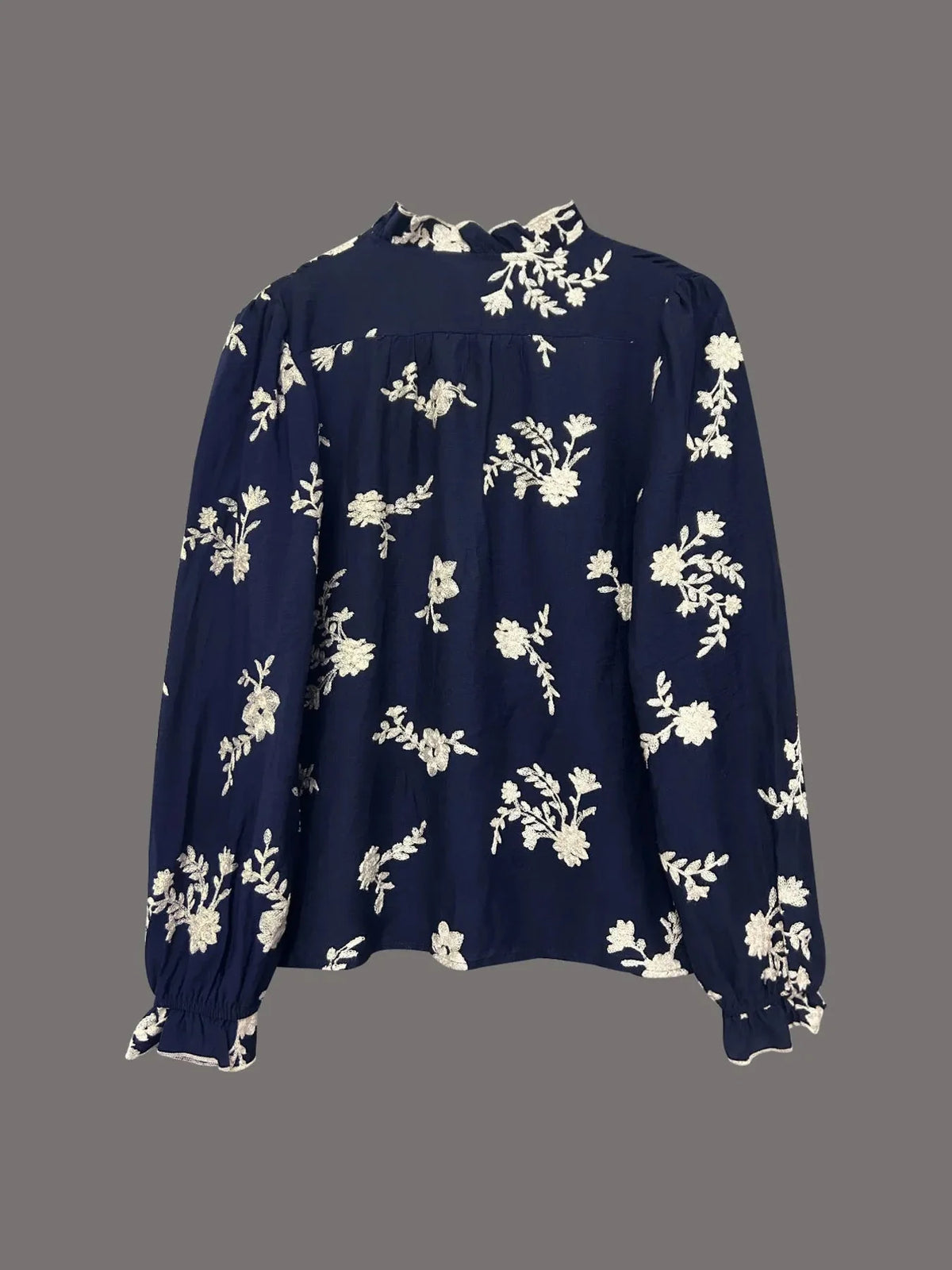 Chemise à manches longues à boutons à motifs floraux