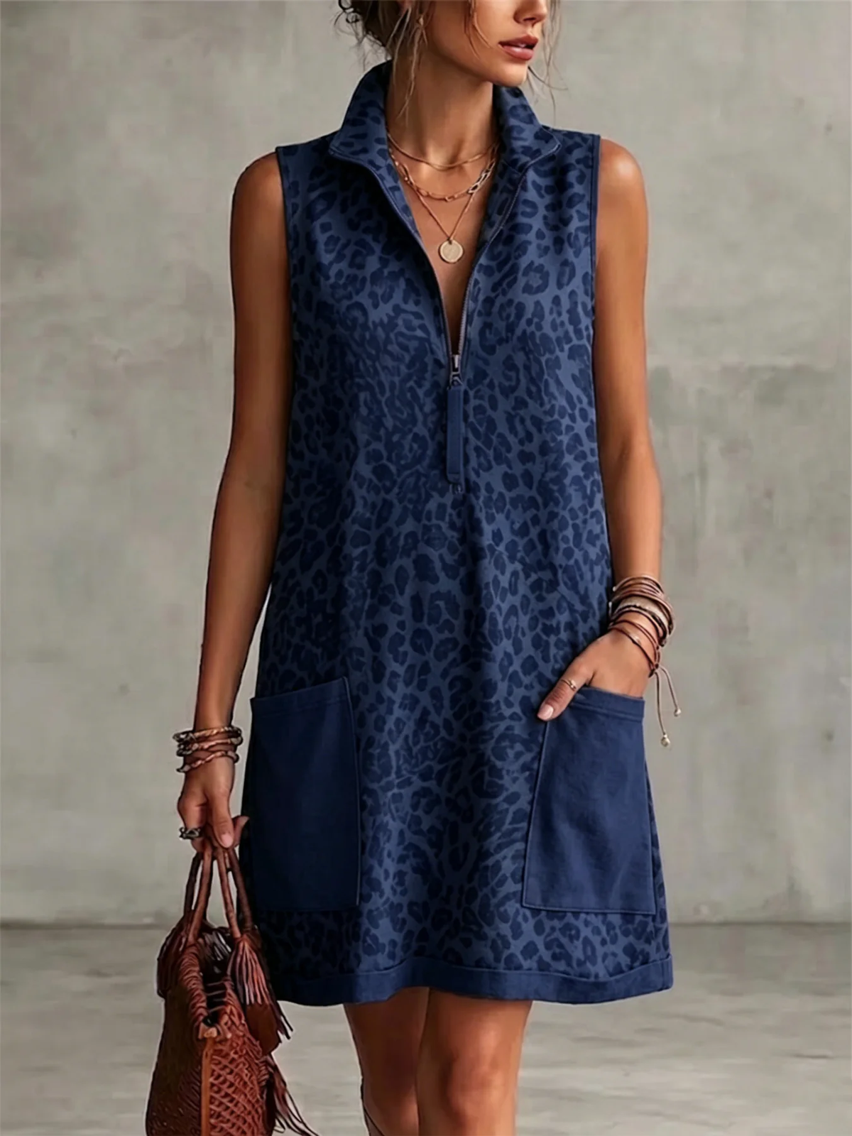 Leopard Print Sleeveless Cropped Dress Featuring A Half-zip Collar And Contrasting Patch Pockets.